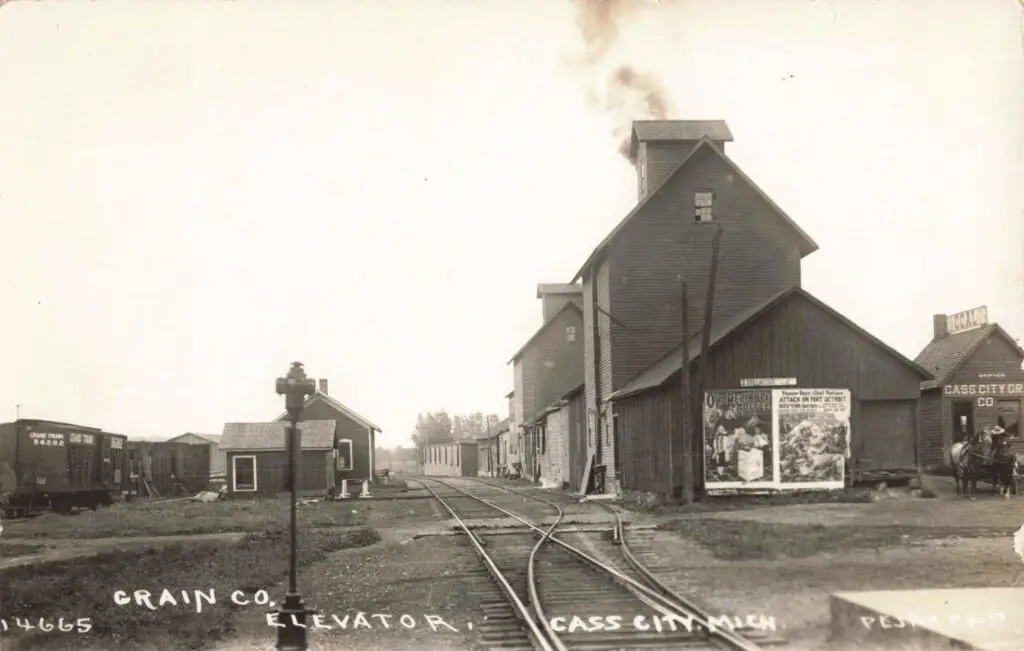 a train tracks next to buildings