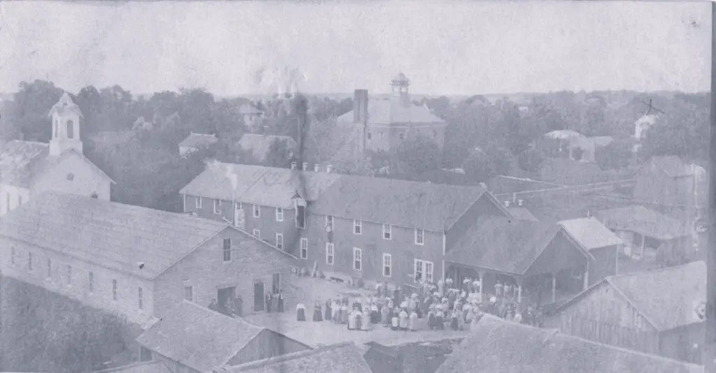a group of people outside of a building