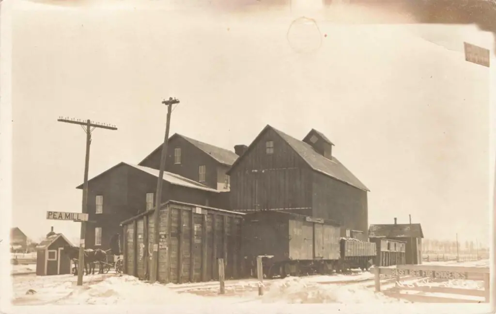 Old mill building in snowy landscape