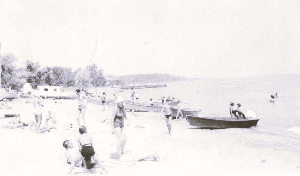 a group of people on a beach