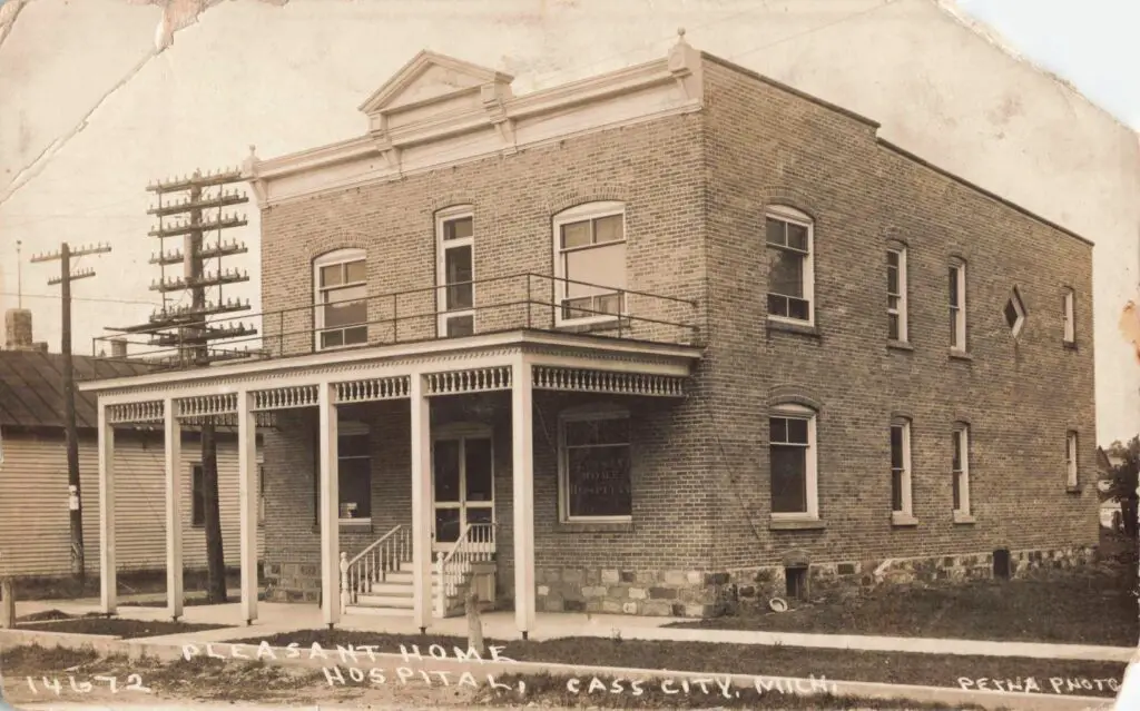 a black and white photo of a brick building