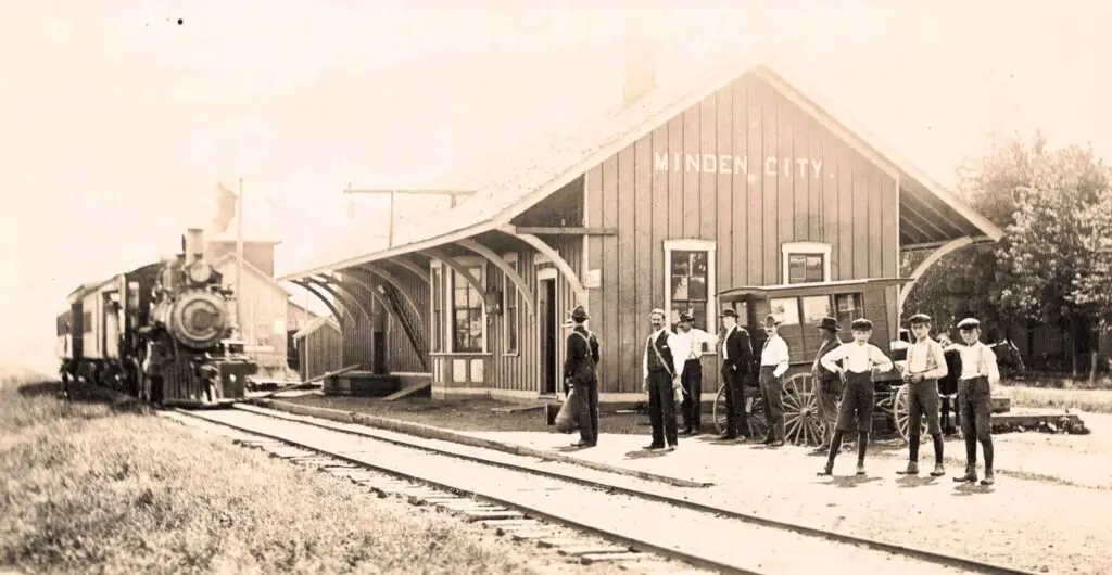 Historic train station with people