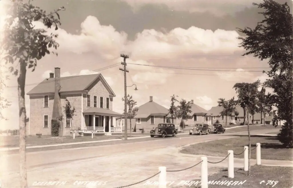 Historic street with vintage cars.