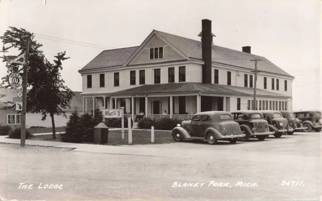 Historic lodge with classic cars.
