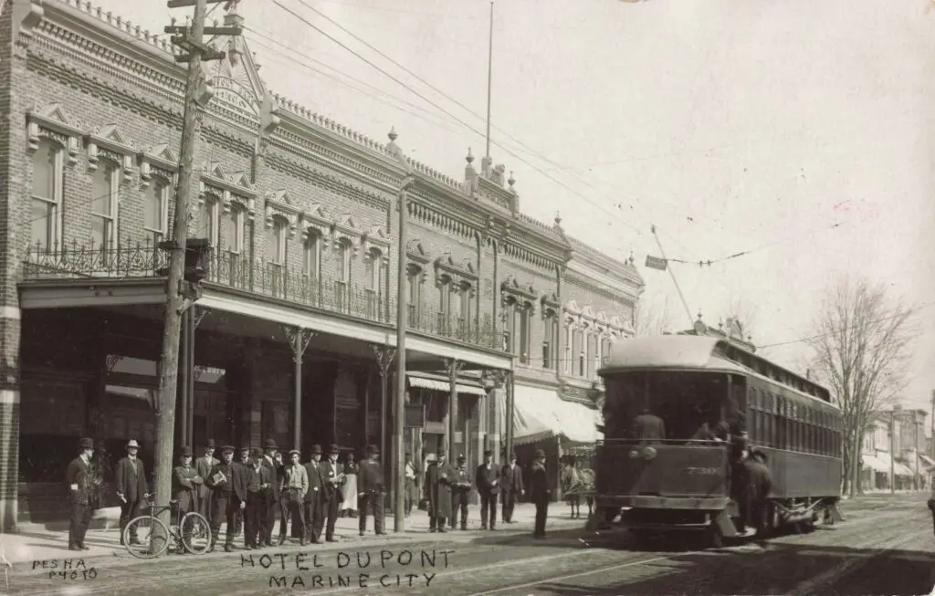 Historic streetcar in front of hotel.