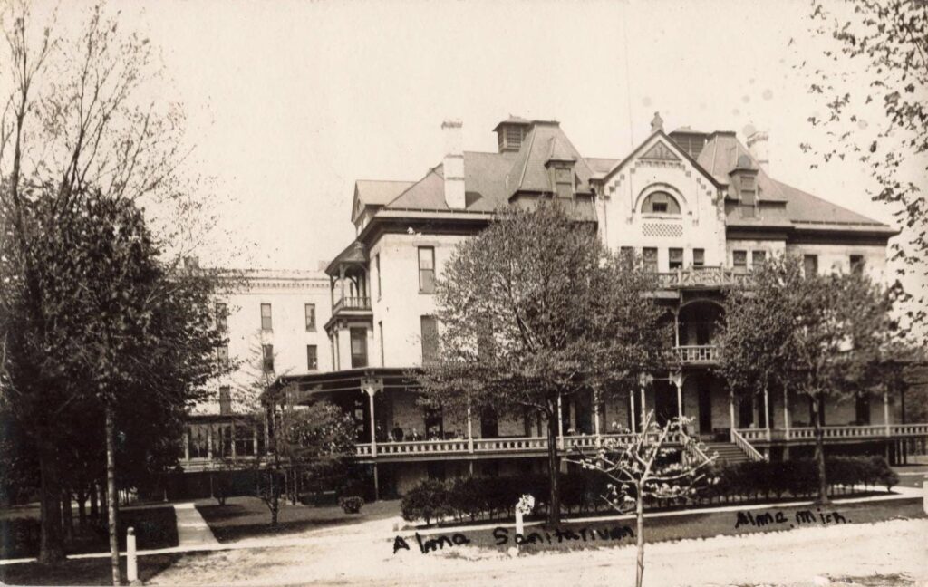 Historic building with large porch.
