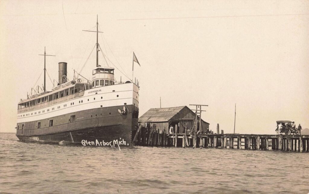 Historic ship docked at pier.