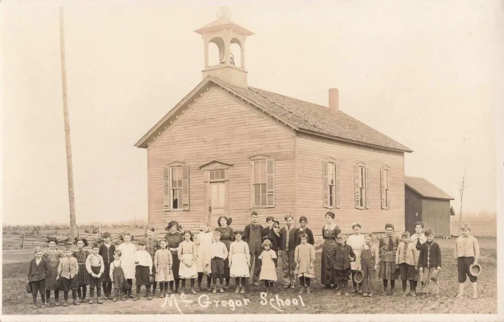 Historic school with children outside