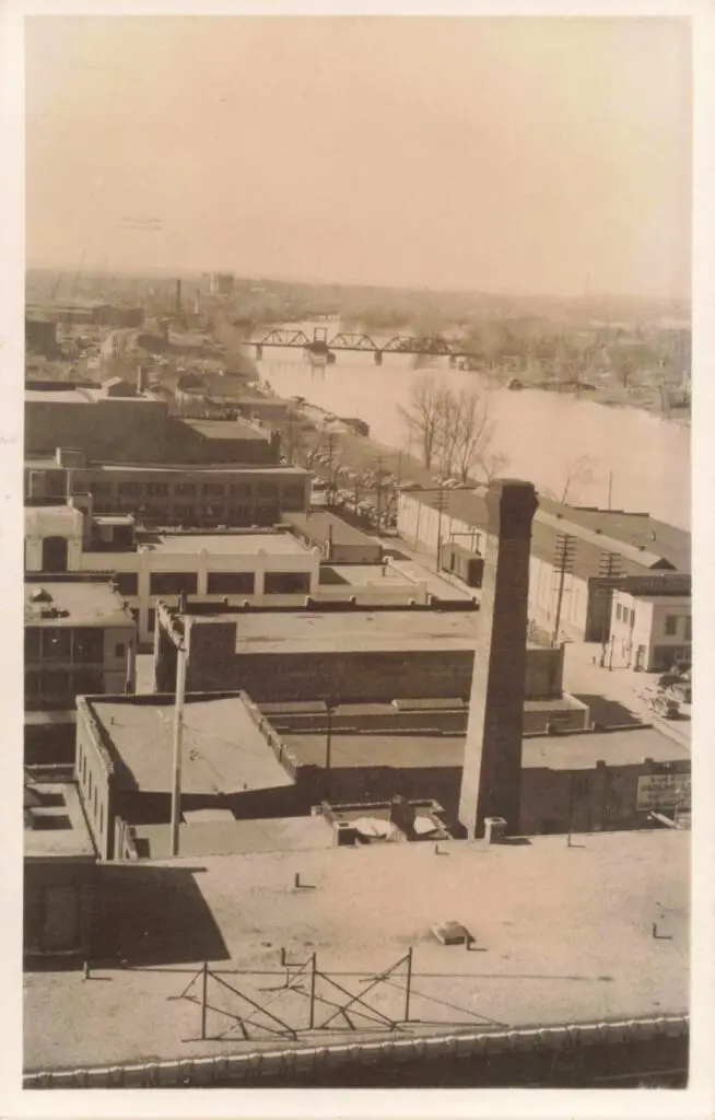 Historic view of industrial riverfront.