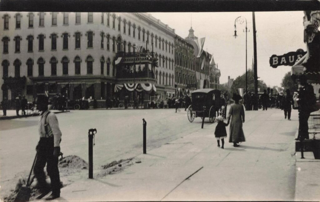 Historic street scene with horse-drawn carriage