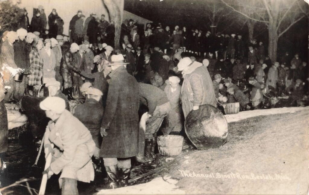 Crowd fishing during smelt run event.
