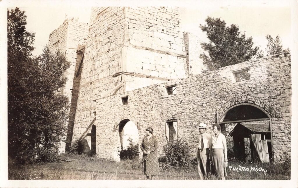 Historic stone ruins with people
