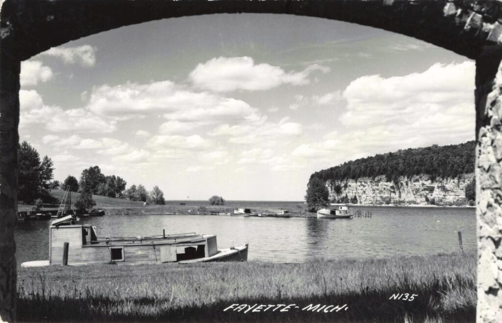 Boats on a calm lake scene.