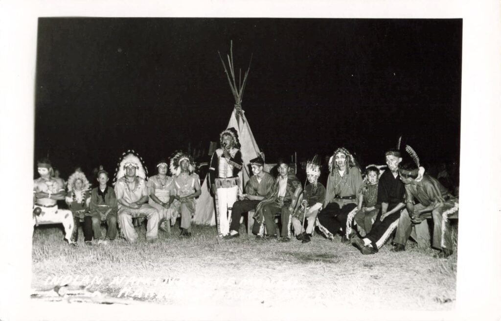 Group in traditional attire at night