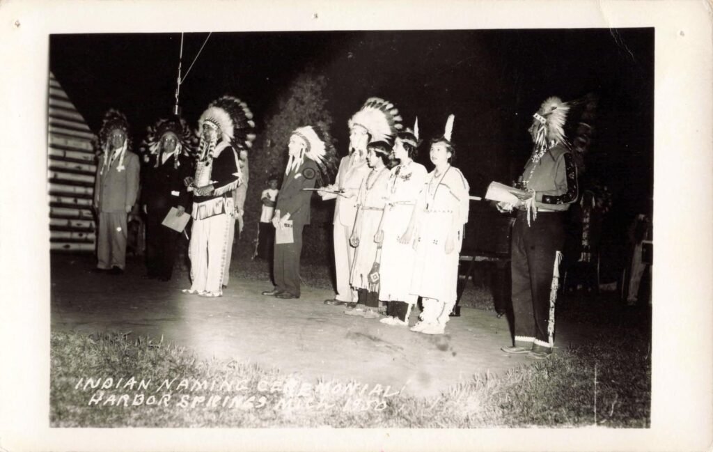 Ceremonial gathering with traditional attire.