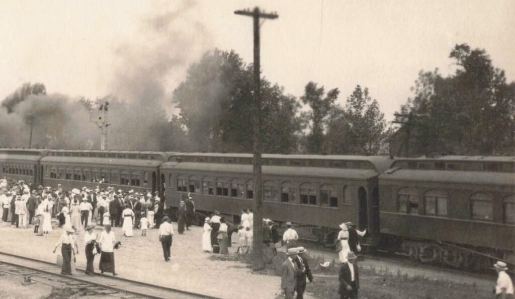 Historic train station with passengers