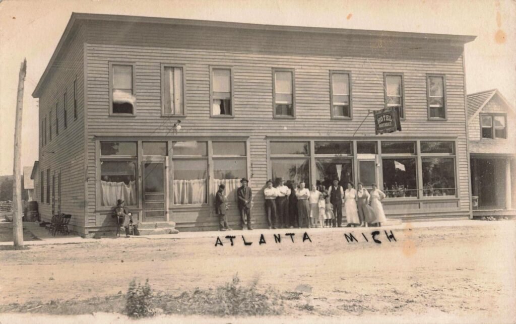 Historic building with people outside.
