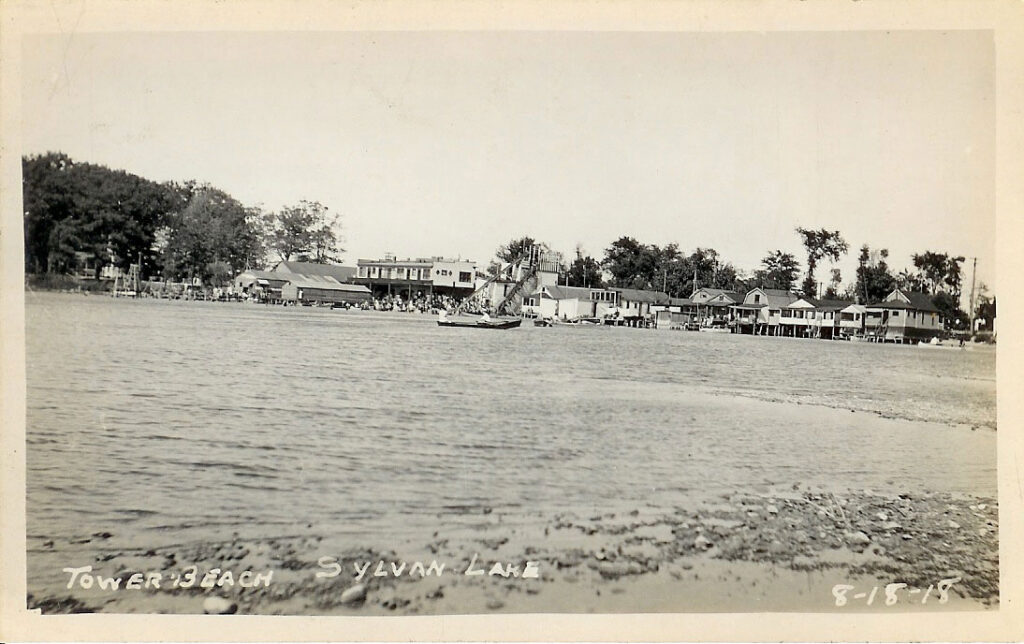 Historic beach scene with boats