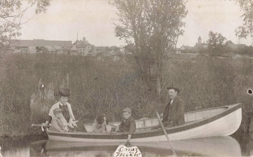 Family boating on a calm river.