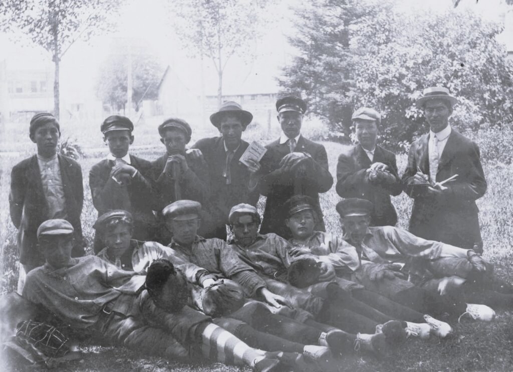 Group of people posing outdoors.
