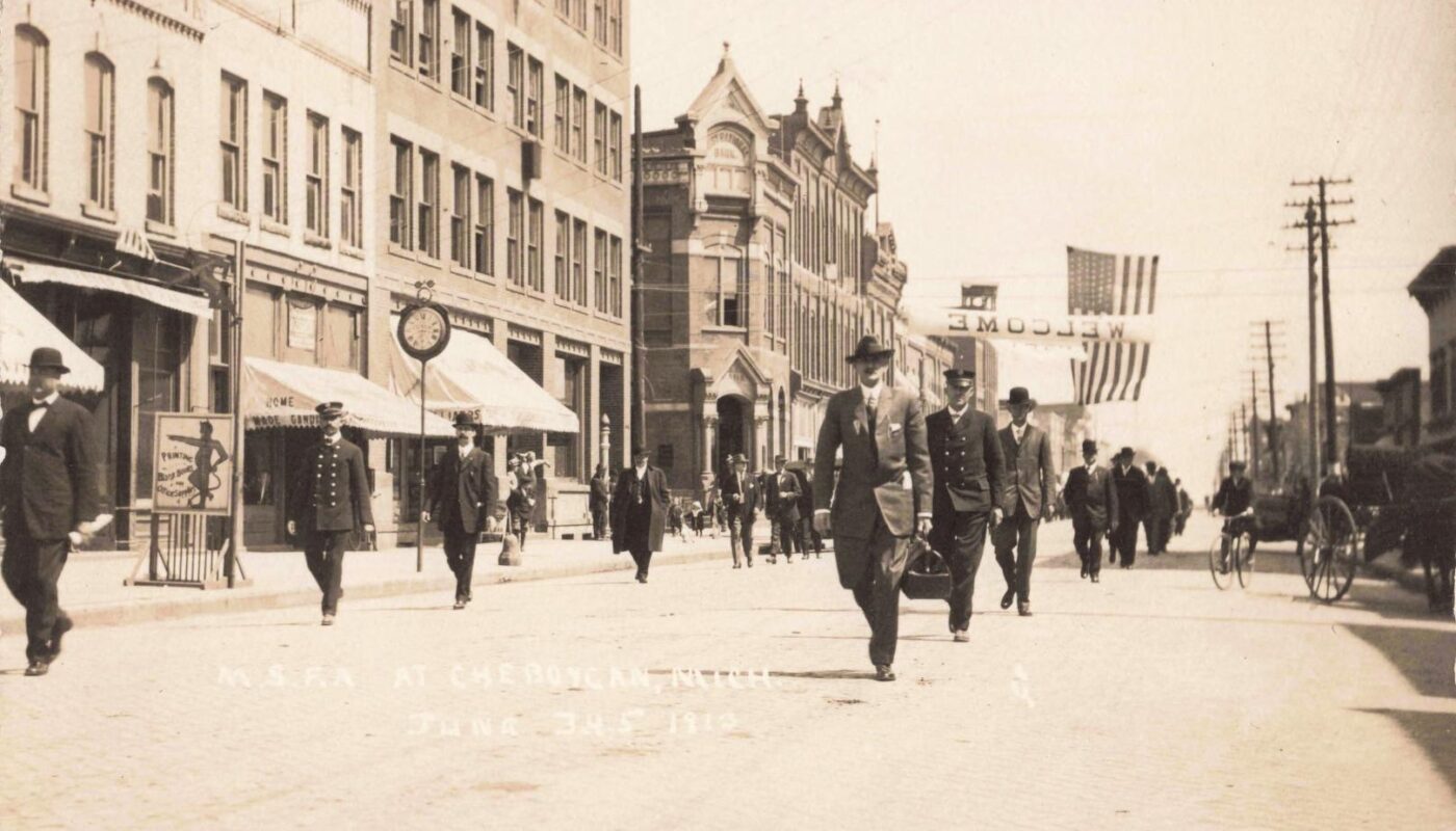 Historic street scene with pedestrians.