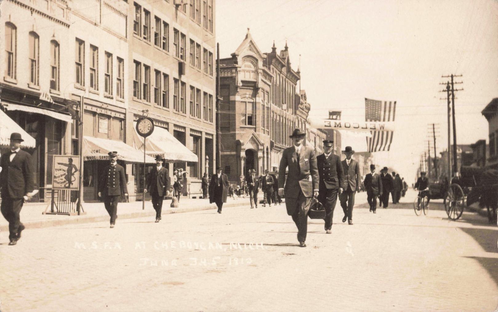 Historic street scene with pedestrians.