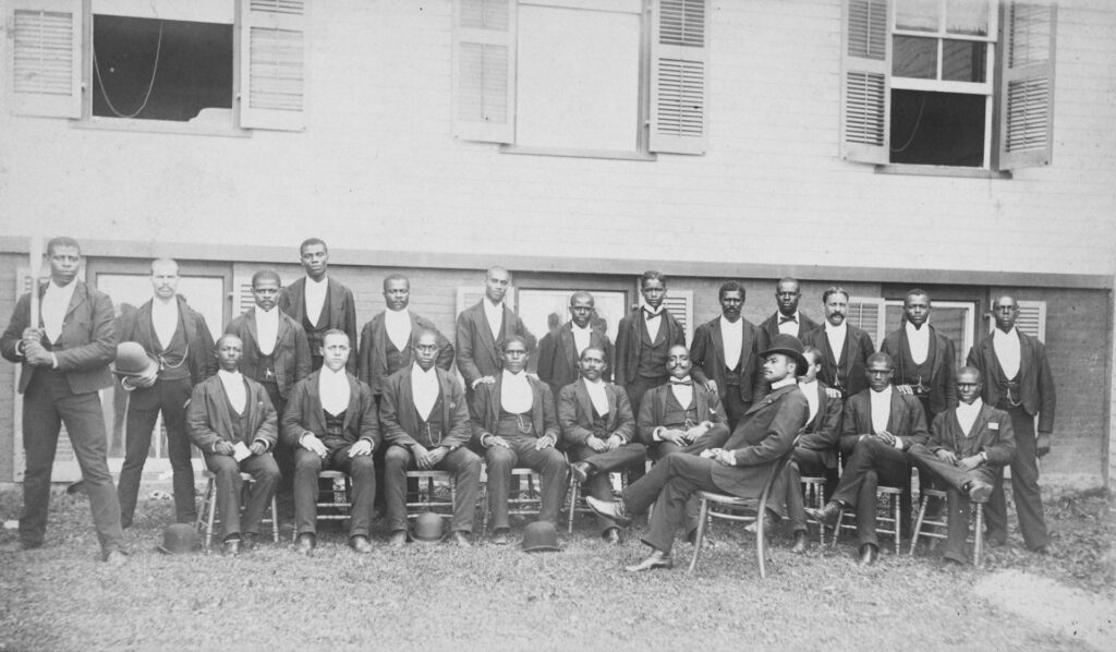 Group of men in formal attire.