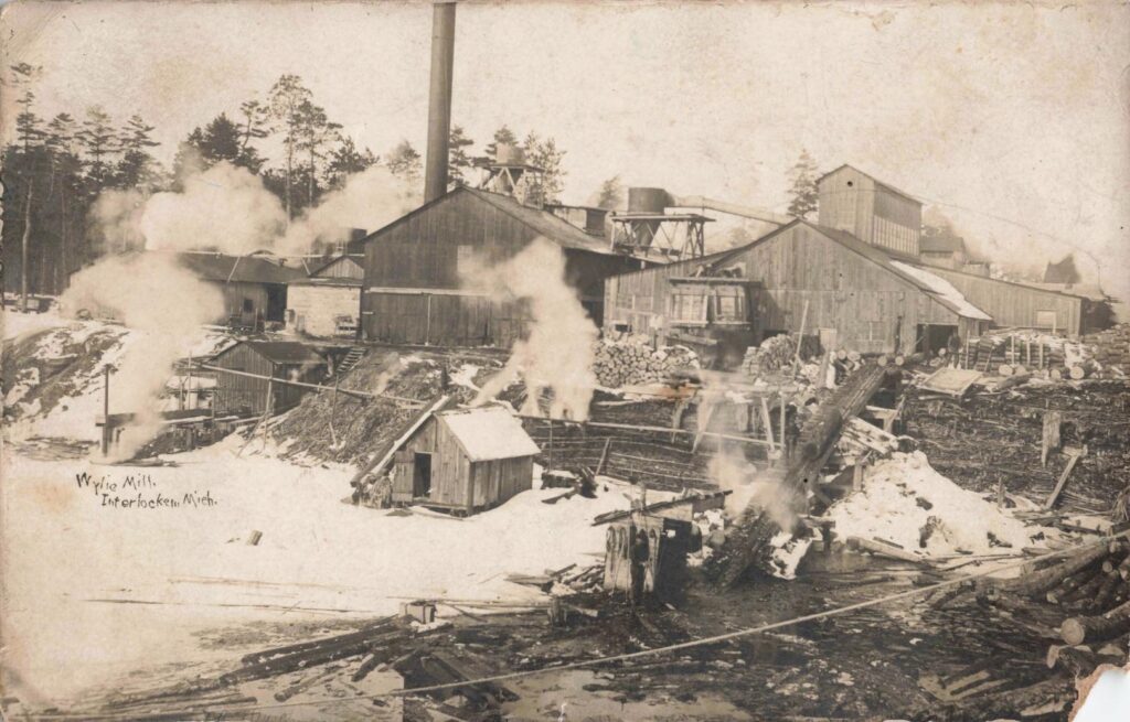 Wylie Mill” in winter. Industrial scenes like this anchor Interlochen’s early work identity. (David V. Tinder Collection, University of Michigan Library Digital Collections.) 