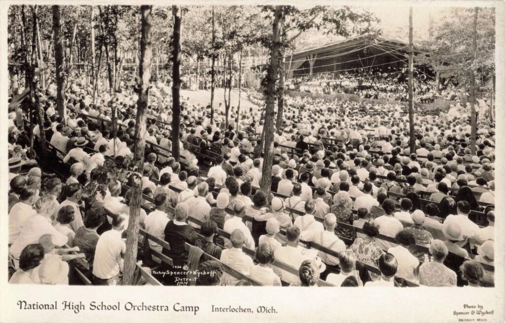  National High School Orchestra Camp scene: young musicians gathered outdoors near the camp’s early facilities. (David V. Tinder Collection, University of Michigan Library Digital Collections.) 