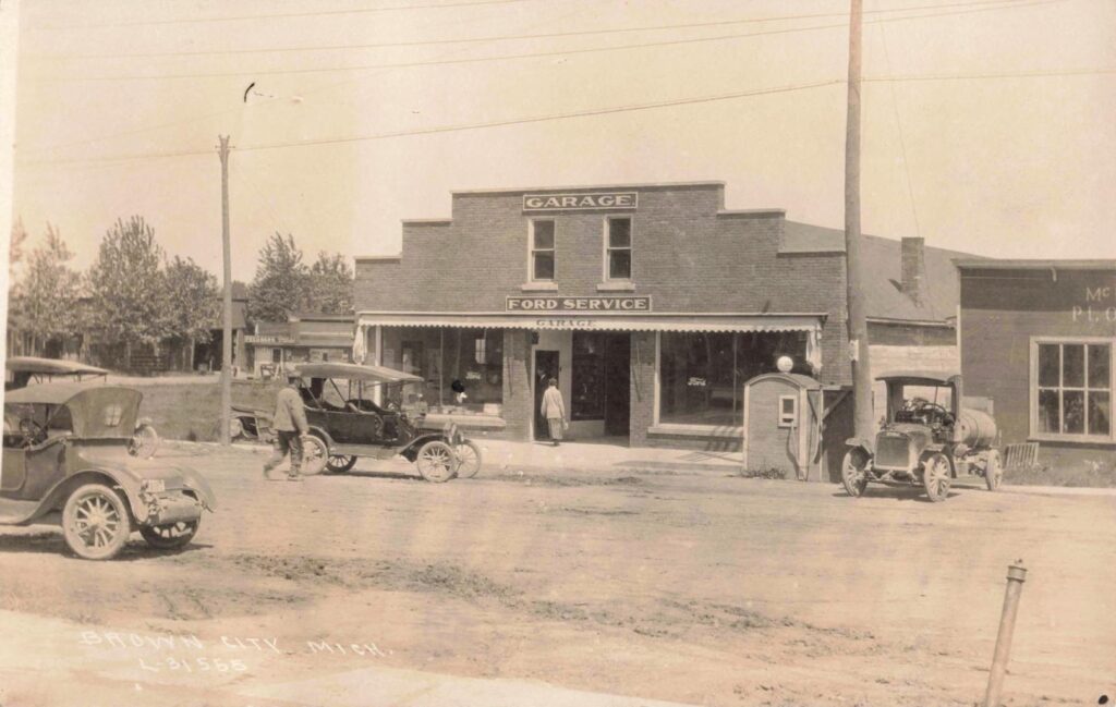 Historic garage with vintage cars in the history of brown city michigan