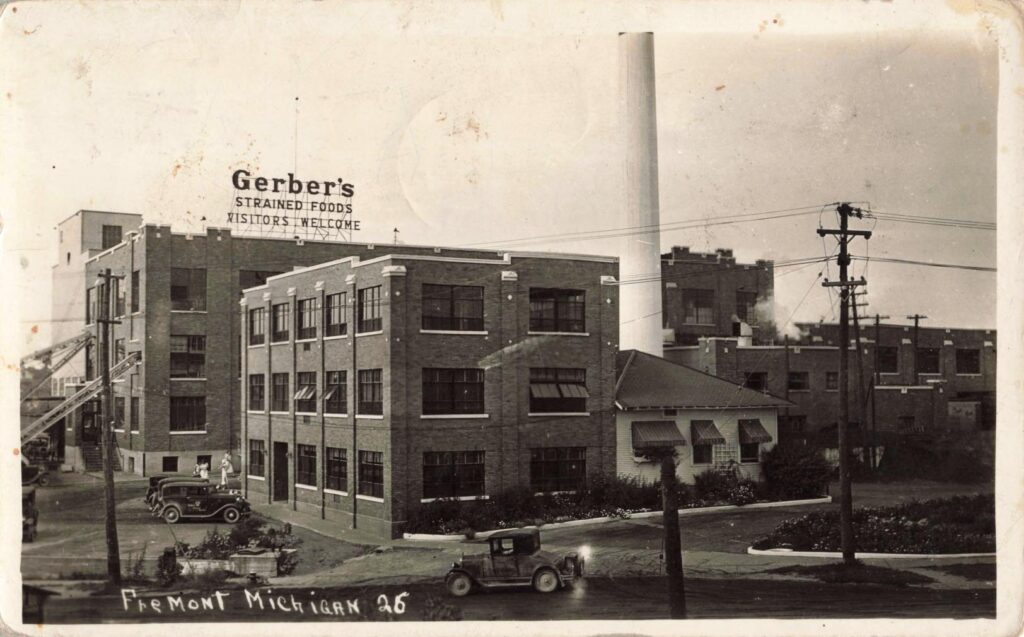 Large factory buildings and smokestacks mark the rise of the Gerber plant. By the 1920s and 1930s, this facility placed Fremont on the national map as a center for baby food production.