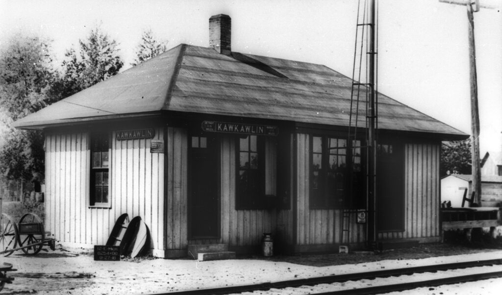 The Kawkawlin railroad depot in the early 20th century, a modest but vital stop along the line connecting Bay City to inland Michigan communities. Stations like this linked farm towns to regional markets, allowing goods, passengers, and news to move efficiently through Bay County.