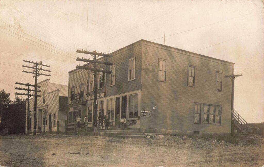 Old building with utility poles.