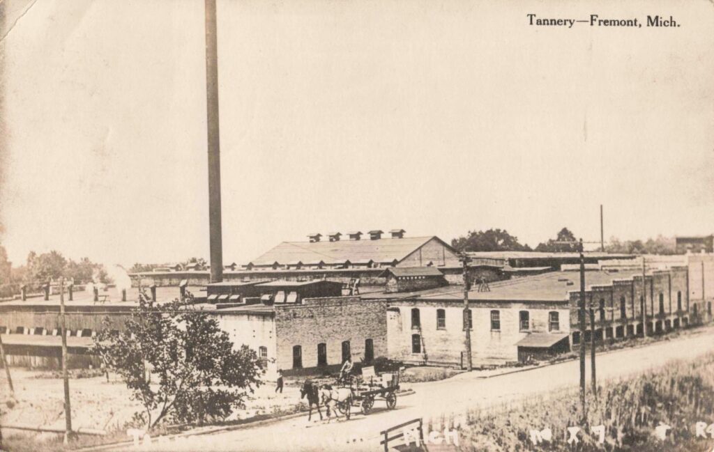 Industrial buildings and smokestacks mark the location of Fremont’s tannery. The facility processed animal hides into leather, providing steady employment during the town’s early industrial period.