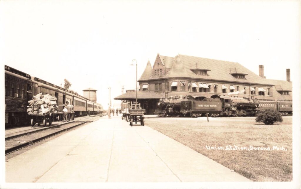 Historic train station with passengers.