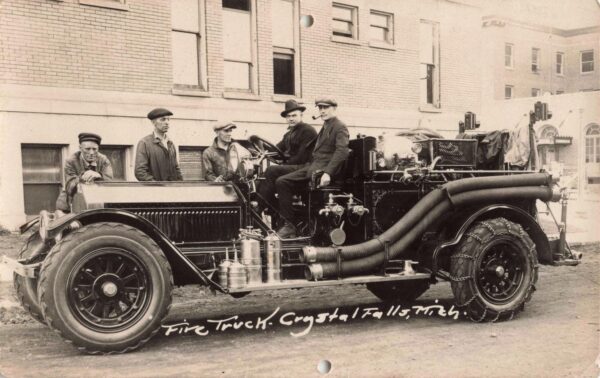 Vintage fire truck with men