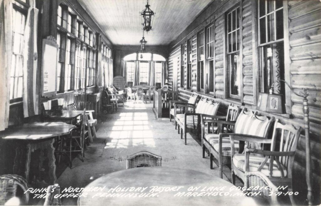 Interior porch seating area at Funk’s Northern Holiday Resort on Lake Gogebic.