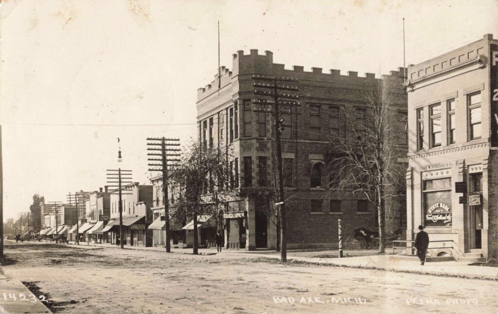 Historic street with early 1900s architecture.