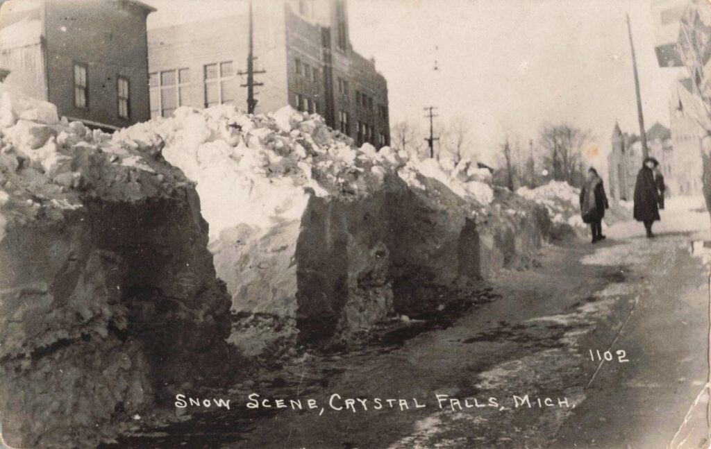 Historic snowy street in Crystal Falls