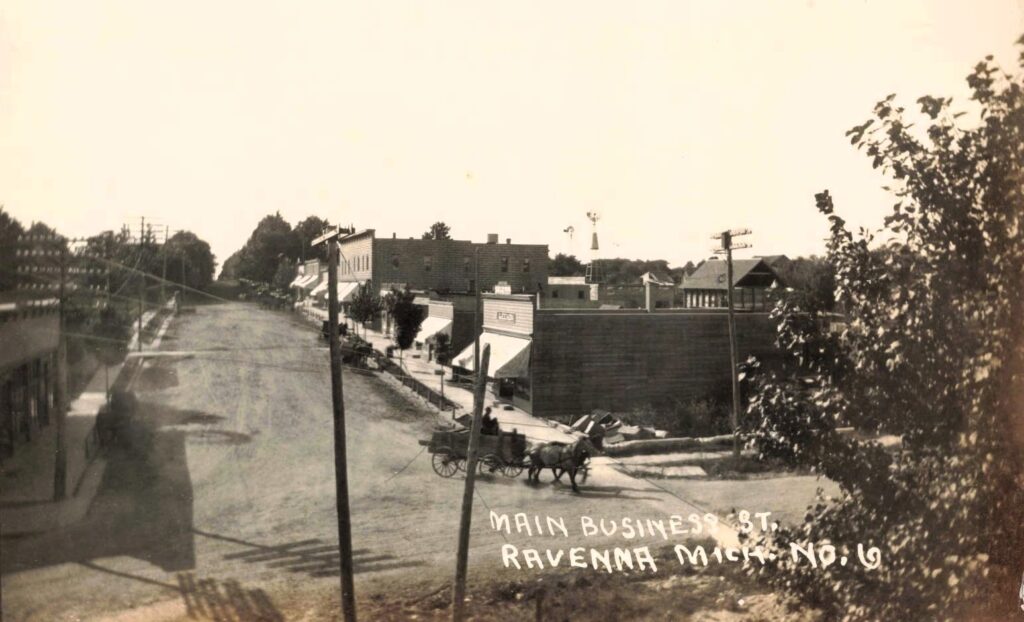 Ravenna Michigan Main Street long view early 1900s dirt road businesses