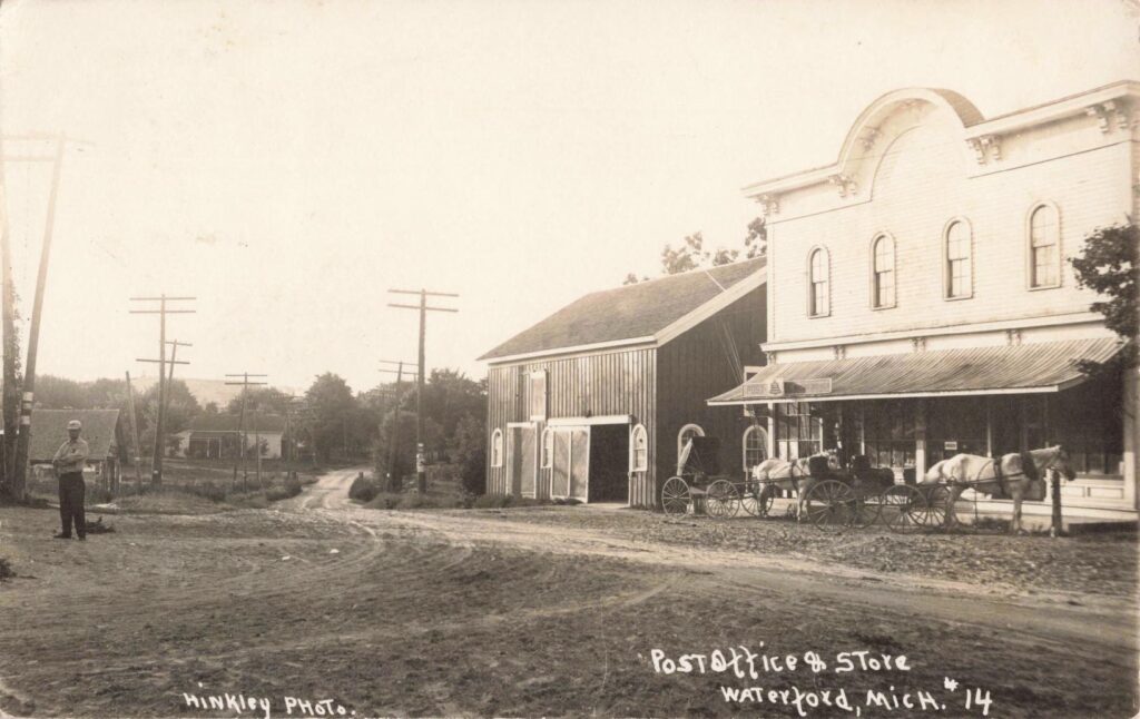 Historic street with horse-drawn carriages