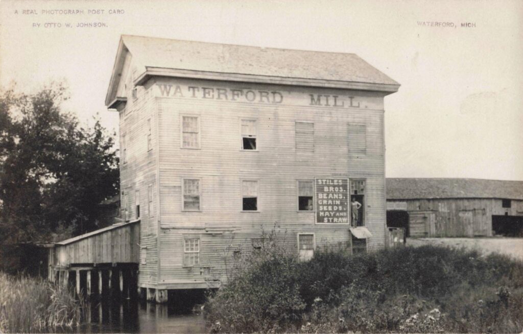 Historic mill building by water