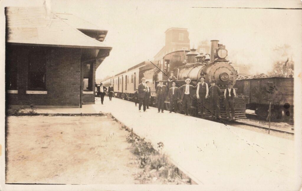 Historic train station with passengers