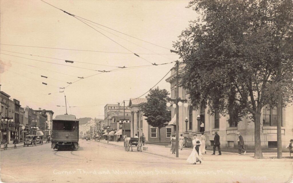 Historic street scene with trolley. - the history of Grand Haven Michigan
