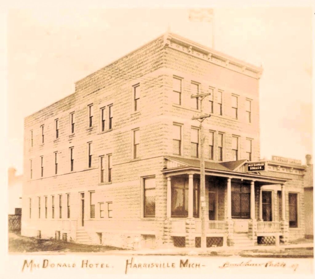 The MacDonald Hotel stood tall on Harrisville’s Main Street, a three-story hostelry built of stone blocks (shown here in 1907).