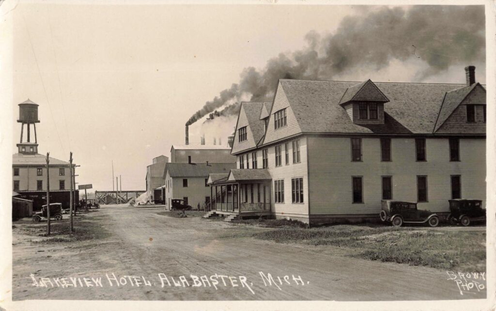 The Lakeview Hotel stood near the industrial core, with factory smoke visible in the background.