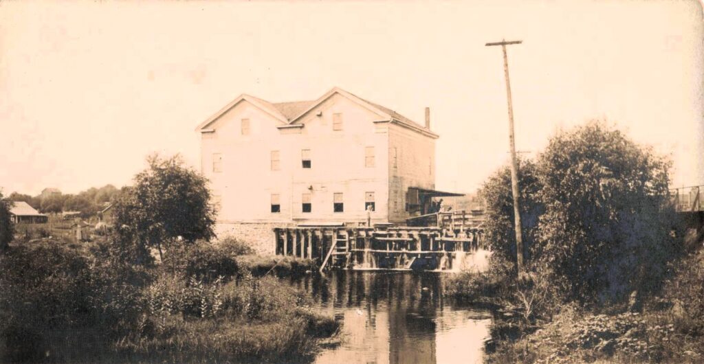 Historic mill by a tranquil stream