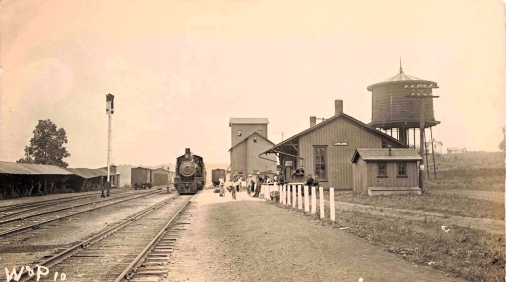 Historic train station with steam locomotive
