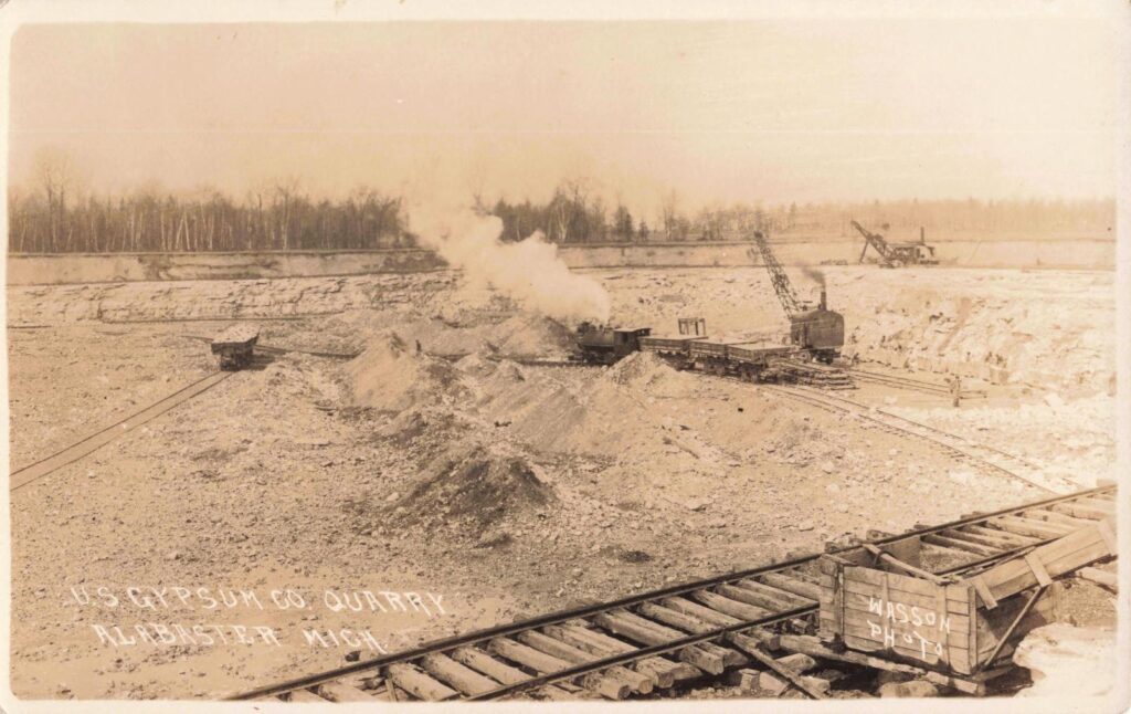 History of Alabaster Michigan -Steam shovels, rail tracks and quarry cars show the scale of early gypsum extraction at Alabaster.