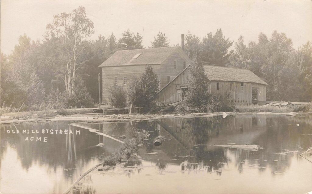 A creekside mill complex in Acme shows the water-powered world that shaped the town’s first working era.